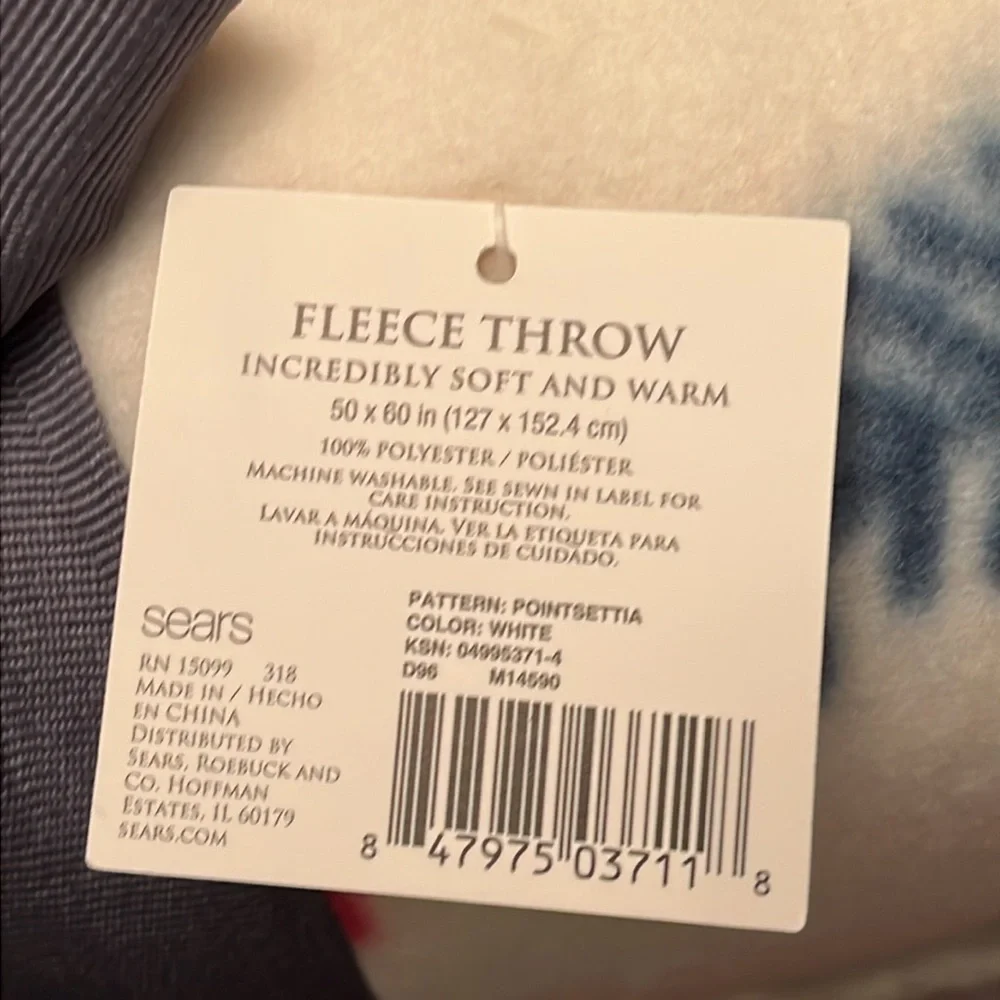 NWT Holiday fleece throw blanket featuring poinsettias, from Colormate